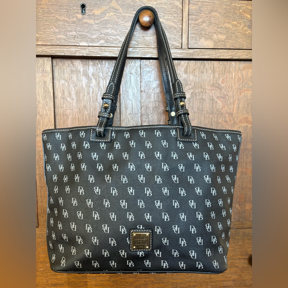 Dooney Bourke black/gray canvas, monogram tote bag leather trim with red lining